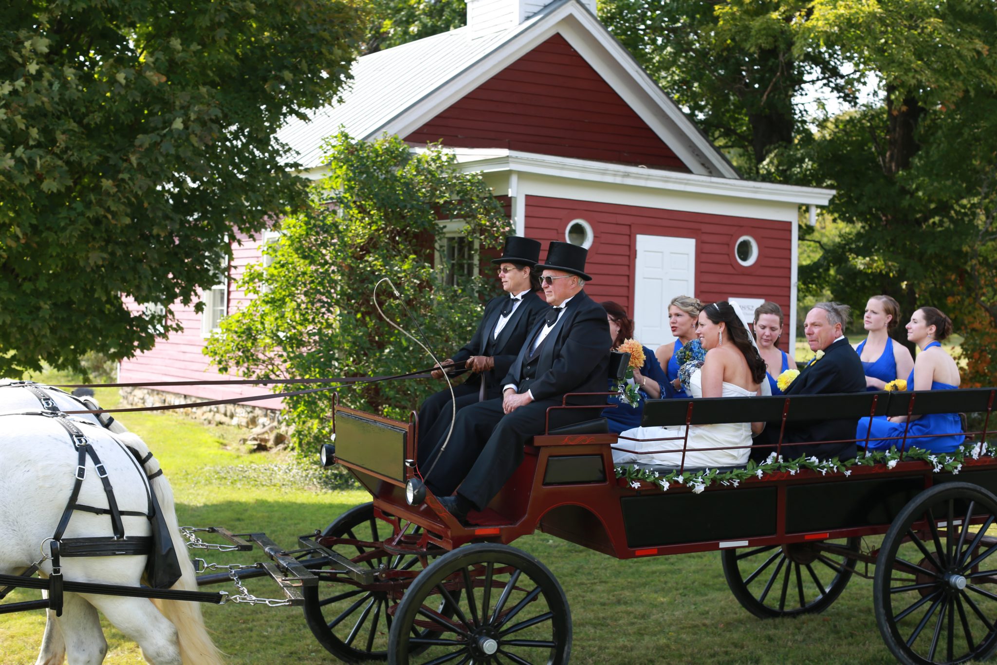 Passing the schoolhouse in horse-drawn carriage at OA